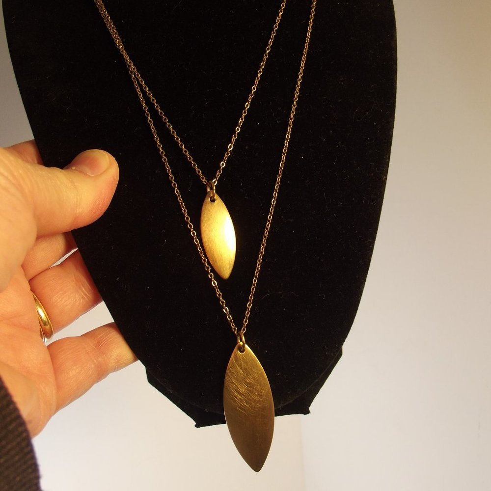 The Limited Necklace Gold Tone Double Strand Leaf Shaped Pendant